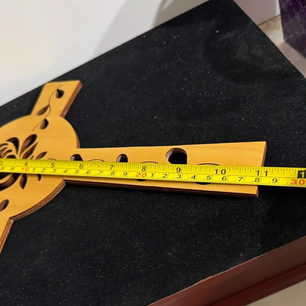 Wooden Celtic cross with a rose and vine cut-out design